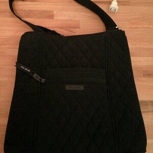 Vera Bradley  Small crossbody purse in navy blue pockets on front,back,& inside